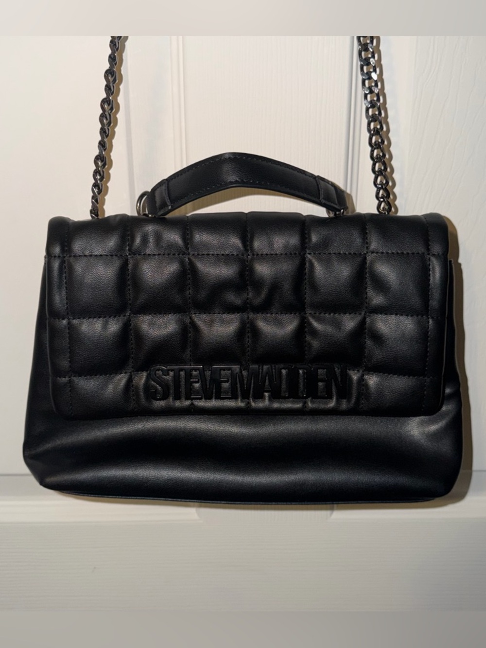 Black Steve Madden Bgali quilted shoulder bag.